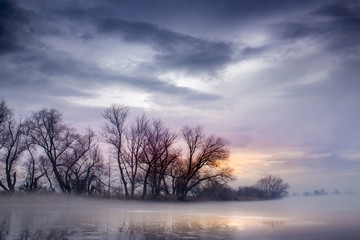 Fototapeta na wymiar Winter sunset by the river