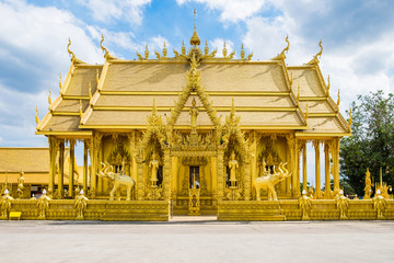 Architecture beautiful temple all gold color with blue sky at bangkla,wat paknam joelo chachoengsao, thailand