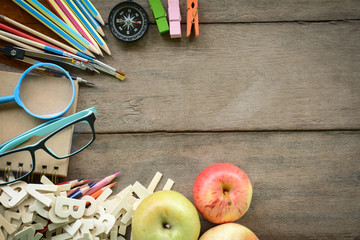 Top view set school supplies on a wooden table with copy space. Back to school