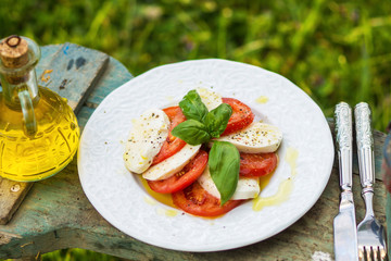Classic Caprese Salad with Mozzarella Cheese, Tomatoes and Basil
