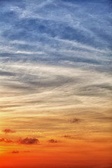 Vertical sky background with gradient from blue to orange