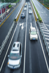 car driving on city road,high angle view,shanghai china.