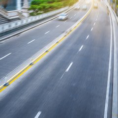City road with moving traffic,tianjin china.