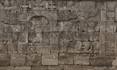 Fototapeta premium Medieval carving on the walls of the Borobudur temple