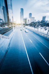 Fototapeta premium City road with moving traffic,tianjin china.