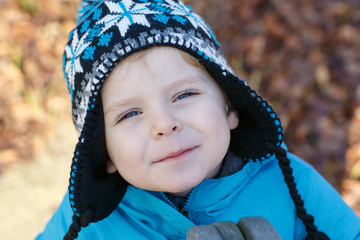 Portrait of little boy of two years outdoor