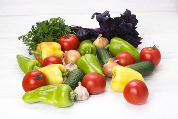 Summer vegetables on white wooden table