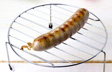 Grilled sausages on the grill