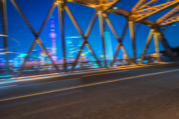 Fototapeta na wymiar blurred light trails at waibaidu bridge,shanghai china.