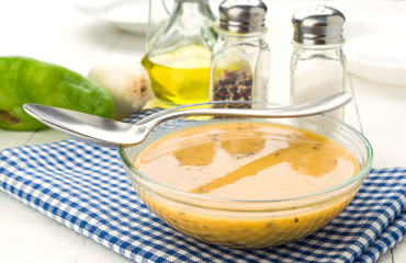 glass bowl cream vegetables on wooden board
