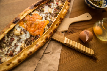 Turkish Pide with egg and minced meat.