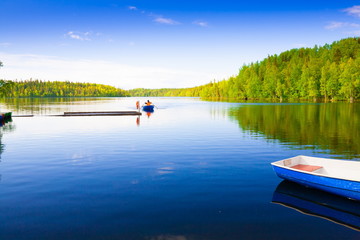 Fototapeta na wymiar Solovki. landscape lake wooden boat day, fishing