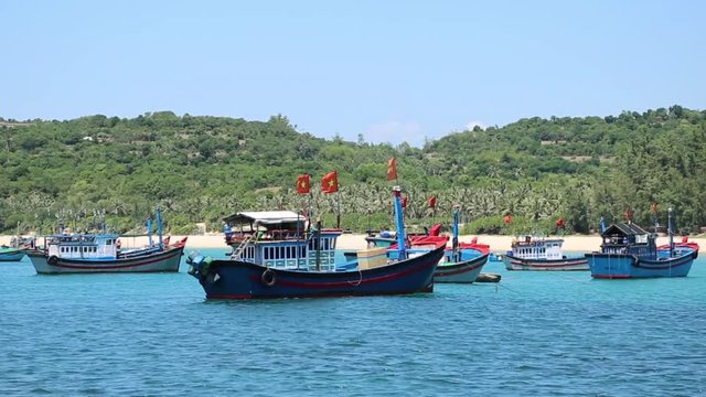 fishing boats in the Bay near the shore