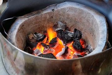 Charcoal burning stove.