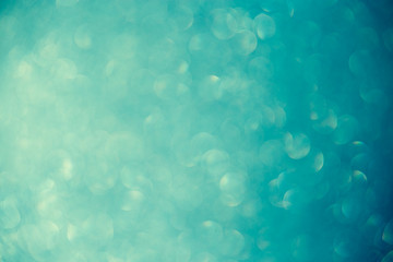 bokeh on turquoise background