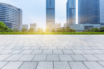 Fototapeta premium Empty brick floor with modern building in Shanghai