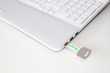 Pendrive in a laptop with the support word