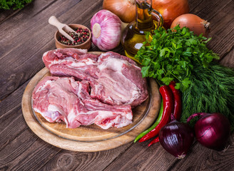 Raw marbled meat steak Ribeye on dark wooden background