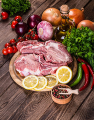 Raw marbled meat steak Ribeye on dark wooden background