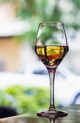 Fotobehang glass of spanish jerez sweet sherry wine in outdoor cafe © TravelPhotography