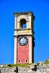 The clock tower of the old fortress in Corfu Town on top of the