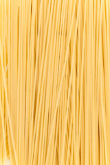 Raw spaghetti on white background.