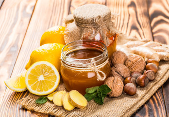 Honey with lemon and nuts.