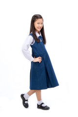 Portrait of Asian child in school uniform on isolated white background