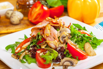 Warm mushroom salad with chilli and tomatoes