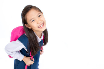 Portrait of asian child in school uniform with school bag on white background isolated