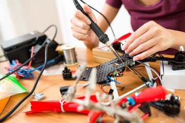 Woman welidng on drone