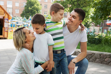 Boys with their parents for a walk