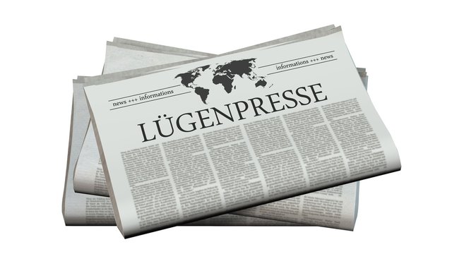 newspaper with the headline lying press