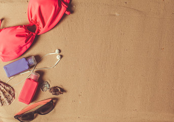 Holiday accessories on sand beach