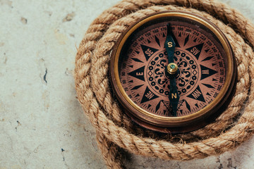 Compass on a gray gradient background