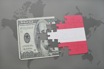 puzzle with the national flag of austria and dollar banknote on a world map background.