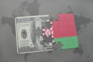puzzle with the national flag of belarus and dollar banknote on a world map background.