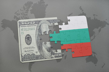 puzzle with the national flag of bulgaria and dollar banknote on a world map background.