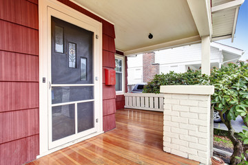 Covered porch of craftsman old American house.