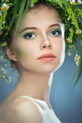 girl wearing a wreath of wildflowers