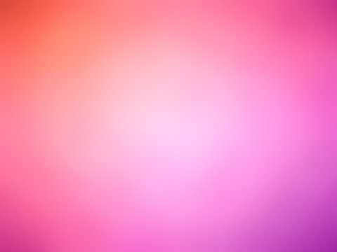 Abstract gradient red pink purple colored blurred background