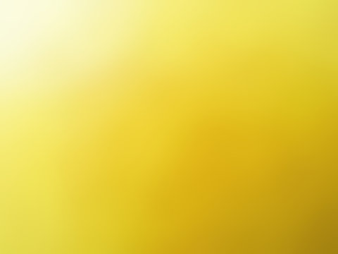 Abstract gradient yellow white colored blurred background