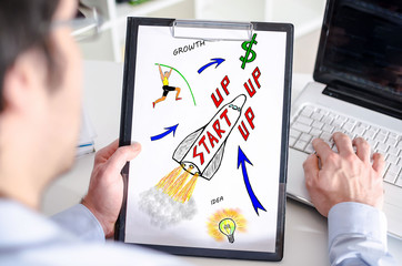 Startup concept on a clipboard