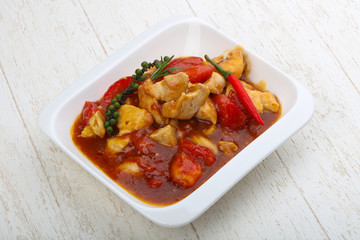 Pork with tomato and pepper