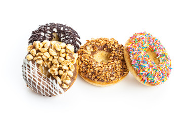 various donuts on white background