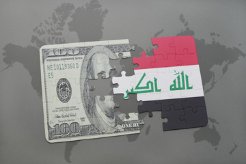 puzzle with the national flag of iraq and dollar banknote on a world map background.