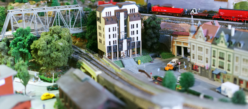 City in miniature. Houses, cars, trees.