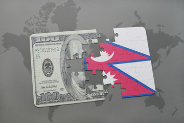 puzzle with the national flag of nepal and dollar banknote on a world map background.