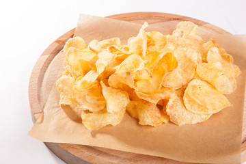 chips on a wooden plate