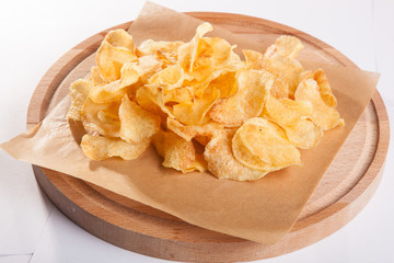 chips on a wooden plate